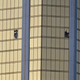 Broken windows are seen on the 32nd floor of the Mandalay Bay Resort and Casino after a lone gunman opened fired on the Route 91 Harvest country music festival on October 2, 2017 in Las Vegas, Nevada. (Photo by David Becker/Getty Images)